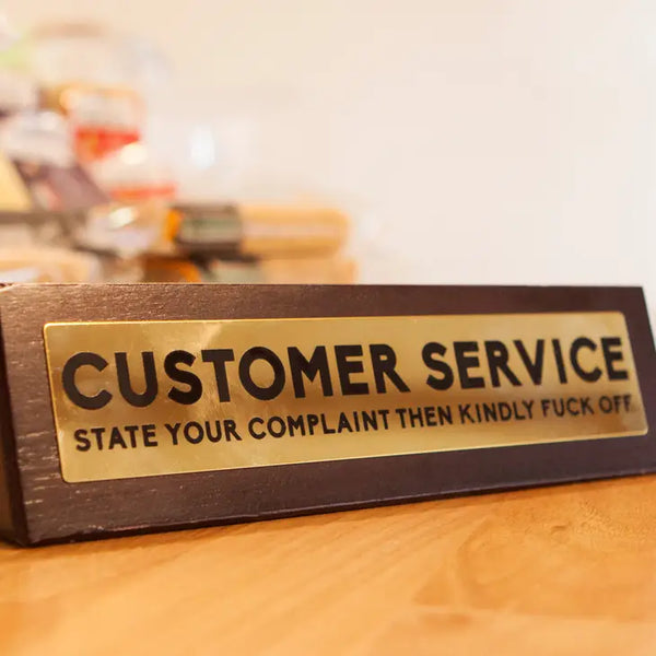Customer Service.  State Your Complaint Then Kindly Fuck Off Wooden Desk Sign